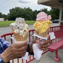 Bruster's Real Ice Cream - Two scoops of ice cream Oreo and Butter Pecan the other was Strawberry with Mango.