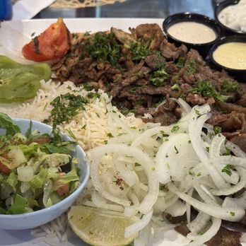 Lama Mediterranean Cuisine - The platter serving Gyro, Beef Shawarma and Chicken shawarma. Huge serving, could only get through half of it. Liked it. - Mediterranean Near Me - Shenandoah, Texas Lama Mediterranean Cuisine - The platter serving Gyro, Beef Shawarma and Chicken shawarma. Huge serving, could only get through half of it. Liked it. - Mediterranean Near Me - Shenandoah, Texas