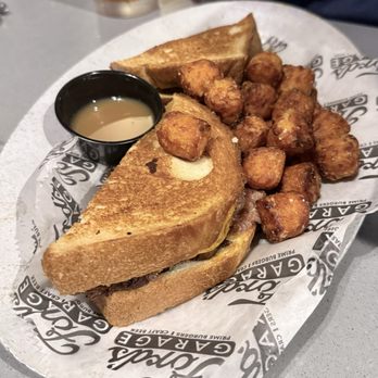 Ford's Garage ChampionsGate - Smoked Brisket Burnt Ends Melt & sweet potato tots! - Bars Near Me - Davenport, Florida Ford's Garage ChampionsGate - Smoked Brisket Burnt Ends Melt & sweet potato tots! - Bars Near Me - Davenport, Florida