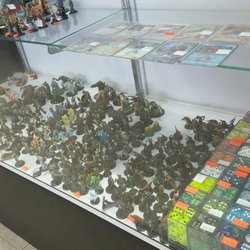 D&D, Pathfinder, and Magic the Gathering miniatures, dice, and Pokemon Singles
