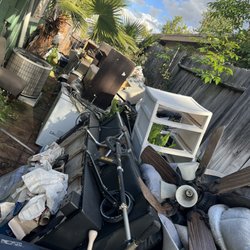 “Take It All” Junk Hauling & Removal - Everything futon plastic small fridge chairs, computer, desk, ceiling fans, dog beds, a couple of empty buckets of paint, bikes, scooters,