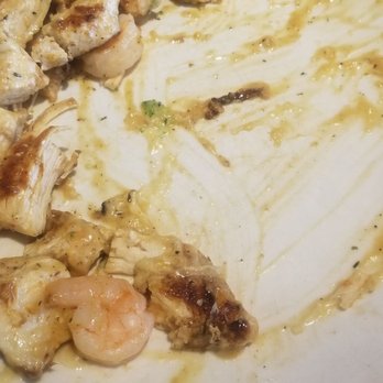 Olive Garden Italian Restaurant - The sauce is brown from the over done bottom of the chicken - Italian Near Me - Longview, Texas