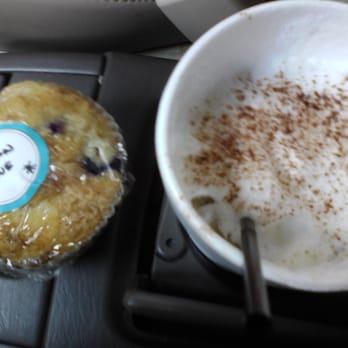 La Prima Tazza - Lemon blueberry muffin and Iced Cocoa Cloud to go - Coffee & Tea Near Me - Lawrence, Kansas La Prima Tazza - Lemon blueberry muffin and Iced Cocoa Cloud to go - Coffee & Tea Near Me - Lawrence, Kansas