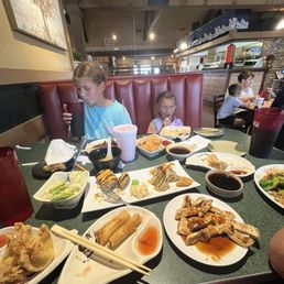 Having a family dinner Having a family dinner