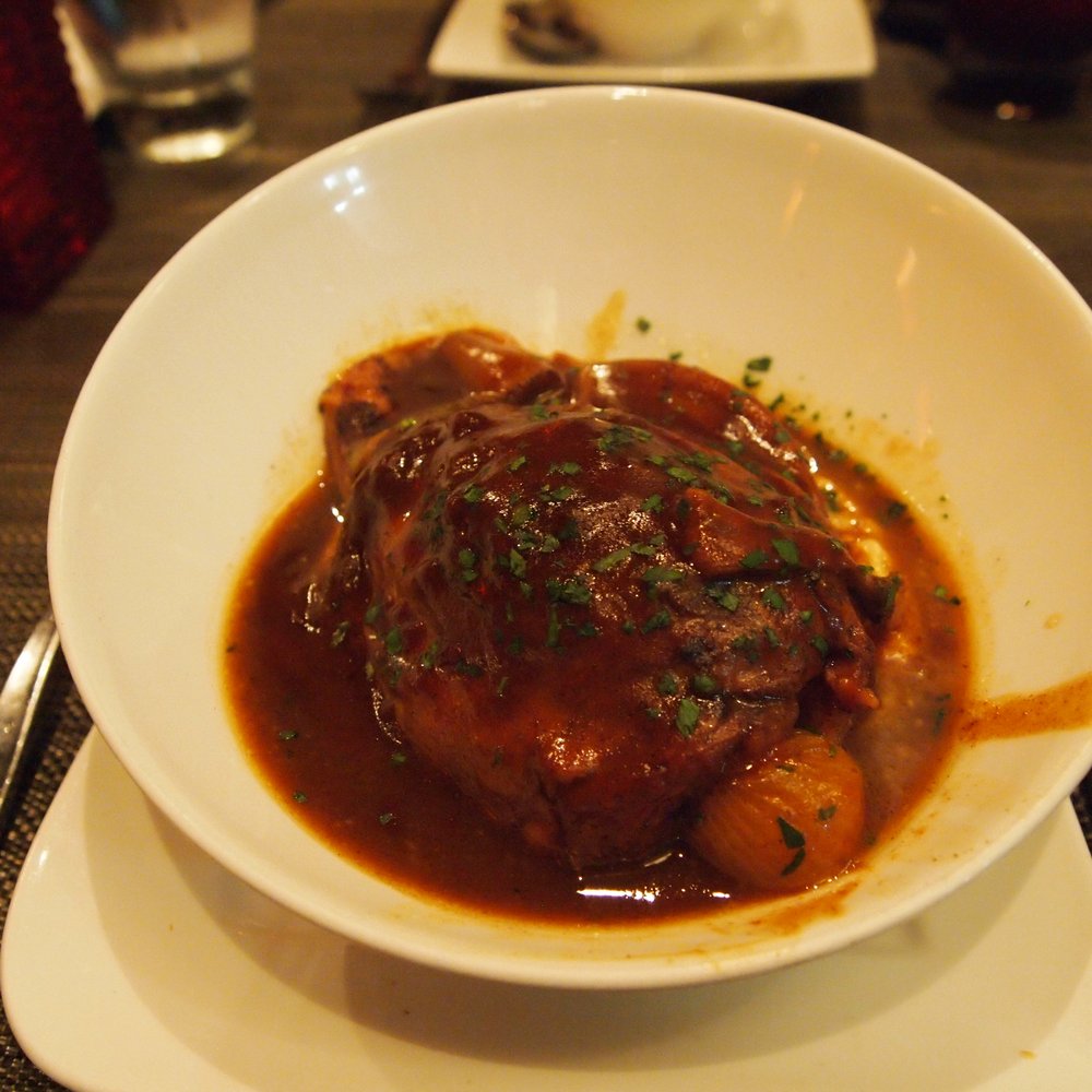 Mejana - braised lamb shank with white truffle whipped potatoes and pearl onions - Mediterranean Near Me - Arlington, Virginia Mejana - braised lamb shank with white truffle whipped potatoes and pearl onions - Mediterranean Near Me - Arlington, Virginia