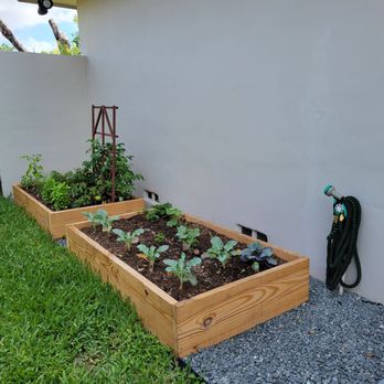 Bernie's Rock & Garden - Grey rocks surrounding the garden from Bernie's - Gardeners Near Me - Miami, Florida