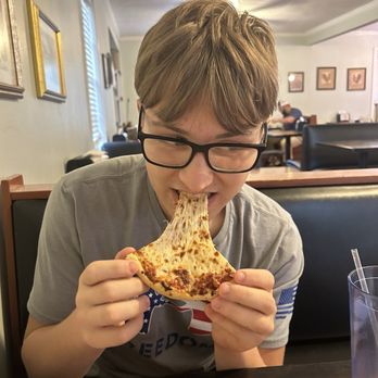 Peggy's Homemade Pizza - That cheese pull! Haha - Pizza Near Me - Natchitoches, Louisiana