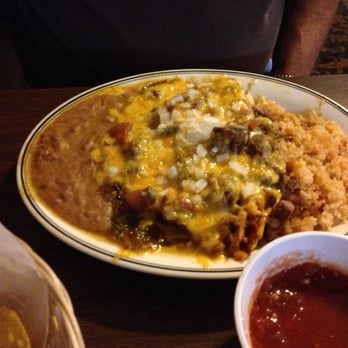 Rosie’s Las Cazuelas - Tamale and Cheese Enchilada with rice and beans covered in Green Chile - Mexican Near Me - Lakewood, Colorado Rosie’s Las Cazuelas - Tamale and Cheese Enchilada with rice and beans covered in Green Chile - Mexican Near Me - Lakewood, Colorado