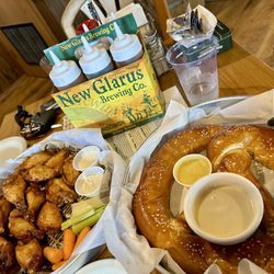 The Thirsty Cow Taphouse - Wings and soft pretzel with cheese and honey mustard