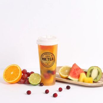 Mr Tea - a cup of tea with fruit on a plate - Bubble Tea Near Me - St. Catharines, Ontario