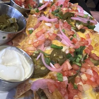 Hard Rock Cafe - loaded nachos - Burgers Near Me - Honolulu, Hawaii Hard Rock Cafe - loaded nachos - Burgers Near Me - Honolulu, Hawaii
