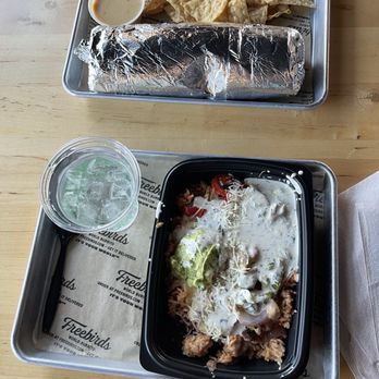 Freebirds World Burrito - Half Burrito Bowl and Super Monster Burrito Chips and Queso! - Mexican Near Me - Denton, Texas