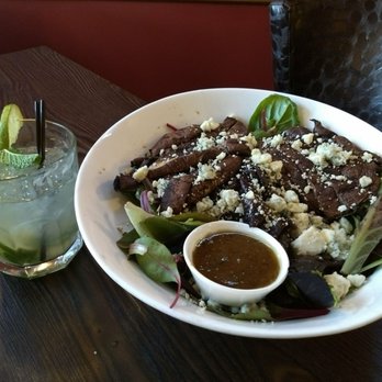 The Hollow Bistro & Brew - Portobello mushroom salad and coconut water cocktail. - Bars Near Me - Clarence, New York The Hollow Bistro & Brew - Portobello mushroom salad and coconut water cocktail. - Bars Near Me - Clarence, New York