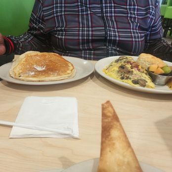 The Toasted Yolk Cafe - A double decker Omelette wilth a side of pancakes. - Sandwiches Near Me - Dothan, Alabama The Toasted Yolk Cafe - A double decker Omelette wilth a side of pancakes. - Sandwiches Near Me - Dothan, Alabama