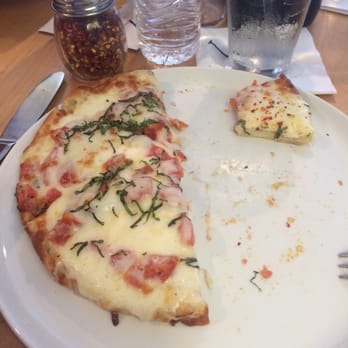 BB's - Tmb pizza (tomato, mozzarella, basil).....about 10 inches in size cut into 6 slices, a meal for one or appetizers for a small group - New American Near Me - Jacksonville, Florida BB's - Tmb pizza (tomato, mozzarella, basil).....about 10 inches in size cut into 6 slices, a meal for one or appetizers for a small group - New American Near Me - Jacksonville, Florida