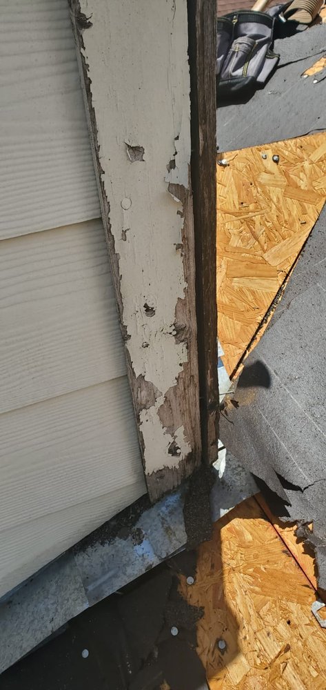 Slide of Truly Roofing & Construction