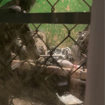 Brainy Actz Escape Rooms - Looking through the Rage Room viewing window. - Escape Games Near Me - Tustin, California Brainy Actz Escape Rooms - Looking through the Rage Room viewing window. - Escape Games Near Me - Tustin, California