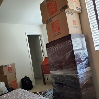 Dominant Moving Company - The movers left the boxes like this, stacked and on top of sideways furniture that they didn't even unwrap - Movers Near Me - San Diego, California