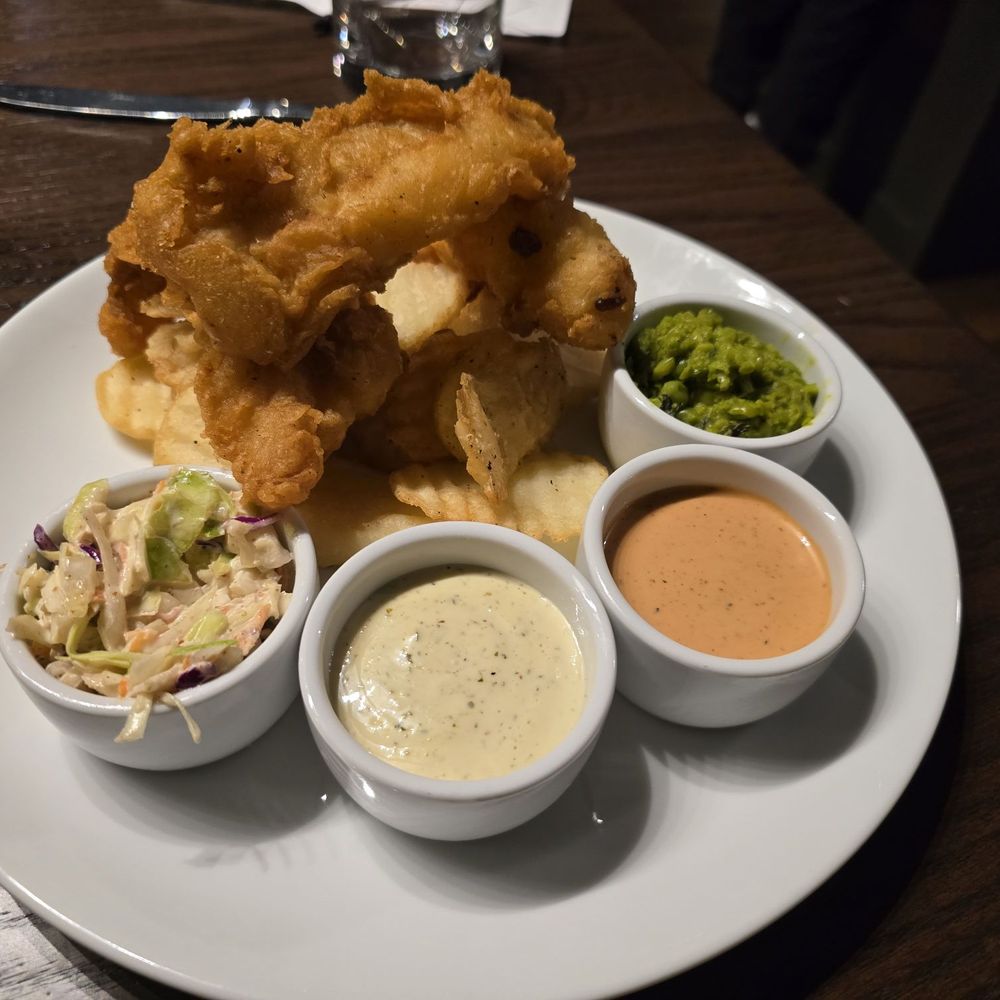 The Lucky Well - Fish and chips with mashed sweet peas, average slaw and hand made potato fries - Salad Near Me - Hamilton, Ohio The Lucky Well - Fish and chips with mashed sweet peas, average slaw and hand made potato fries - Salad Near Me - Hamilton, Ohio