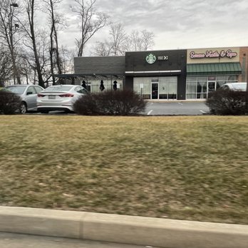 Starbucks - cars parked in front of a starbucks coffee shop - Coffee & Tea Near Me - Fallston, Maryland