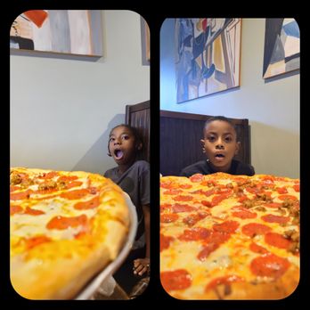 Picasso's - Large NY style pizza w/ pepperoni and sausage. My kids made it through 1.5 pcs each before tapping out - Pizza Near Me - Jacksonville, Florida Picasso's - Large NY style pizza w/ pepperoni and sausage. My kids made it through 1.5 pcs each before tapping out - Pizza Near Me - Jacksonville, Florida
