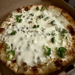White pizza with broccoli and garlic White pizza with broccoli and garlic