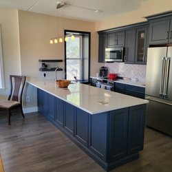 Norfolk Hardware & Home Center - Expanded kitchen peninsula, redesign of cabinets and closet and floor installation.