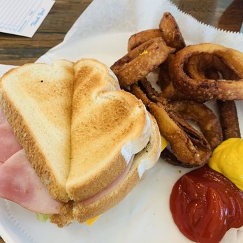 Crazy Mule Restaurant and Catering - The club sandwich with overcooked onion rings - New American Near Me - Greensburg, Kansas Crazy Mule Restaurant and Catering - The club sandwich with overcooked onion rings - New American Near Me - Greensburg, Kansas