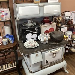 Mildred’s Spice Corner - Antique stove used as merchandise display décor within the shop