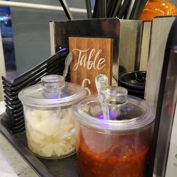 Pho Hue - Pickled garlic (sweeter than i'm used to) and the usual sauces - Vietnamese Near Me - Scarborough, Ontario Pho Hue - Pickled garlic (sweeter than i'm used to) and the usual sauces - Vietnamese Near Me - Scarborough, Ontario