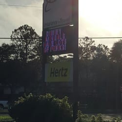 Hertz Rent A Car - Sign from US 19...it's right next to the Red Roof Inn