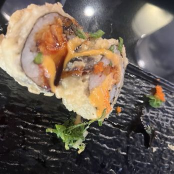 Oumi Sushi - Another visual of crispy salmon roll - Japanese Near Me - Austin, Texas Oumi Sushi - Another visual of crispy salmon roll - Japanese Near Me - Austin, Texas