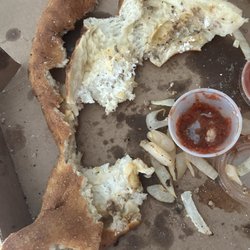 Hometown Pizza and Grill - Half of the calzone had NO MEAT