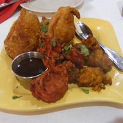Photo of Passage To India - Orlando, FL, United States. Vegetable Platter = Amazing! The onion bhaji is incredible.