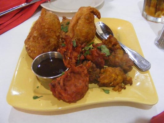 Photo of Passage To India - Orlando, FL, US. Vegetable Platter = Amazing! The onion bhaji is incredible.