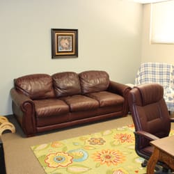 Arizona Breastfeeding Center - Consult rooms at the Arizona Breastfeeding Center.  Each room has comfortable furniture and is set up like a living room.