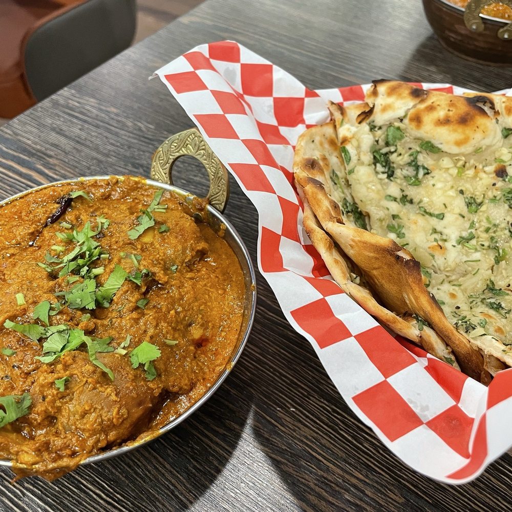 Dhamaka - Garlic Naan & Kadai Chicken Curry - Indian Near Me - Vancouver, British Columbia Dhamaka - Garlic Naan & Kadai Chicken Curry - Indian Near Me - Vancouver, British Columbia