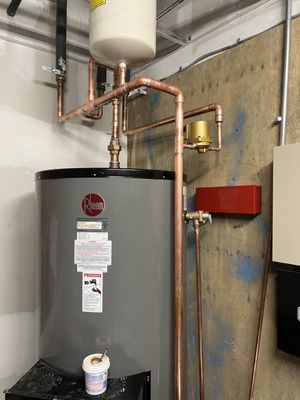 Alvarez Plumbing and Heating Logo