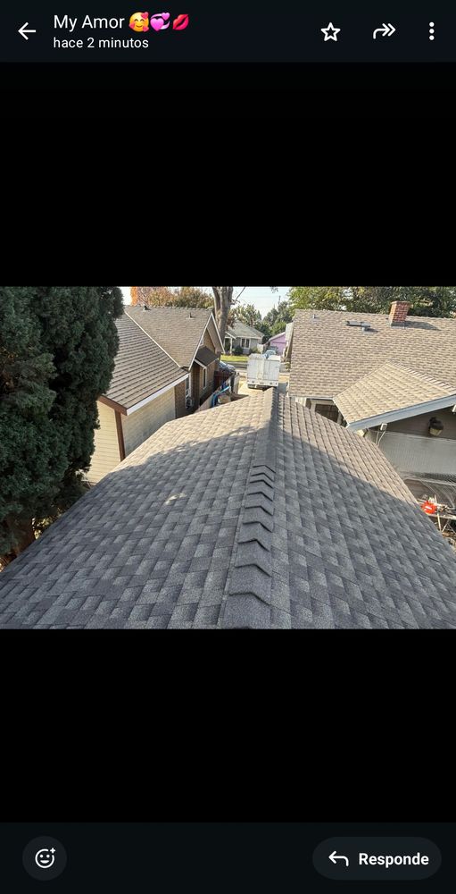 Slide of E&J Roof Service