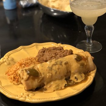 Chuy's - Chuychanga* with Queso and Green Hatch Chile Sauce - Tex-Mex Near Me - Carmel, Indiana