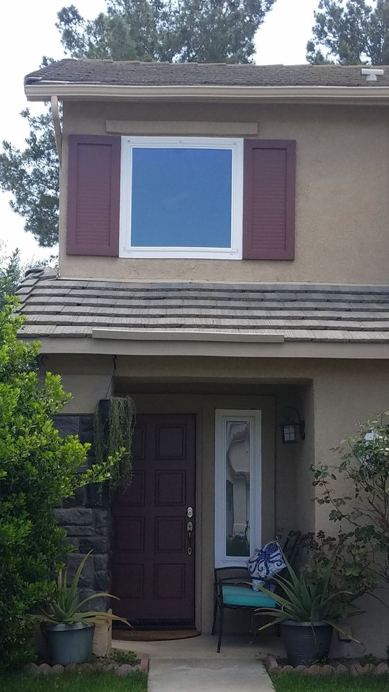 Slide of New Era Roofing