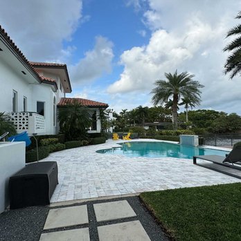 A Sanchez Landscaping - a pool and lounge chairs - Tree Services Near Me A Sanchez Landscaping - a pool and lounge chairs - Tree Services Near Me