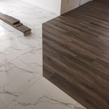 Brasfor Floors - a hardwood floor in a living room - Flooring Near Me Brasfor Floors - a hardwood floor in a living room - Flooring Near Me
