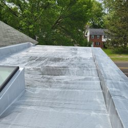 Van Derhoof Roofing - THE BRAND NEW SPECTACULAR FLAT ROOF WITH NEW SKYLIGHT