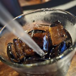 Corned Beef - The glass of Dr. Pepper with ice.