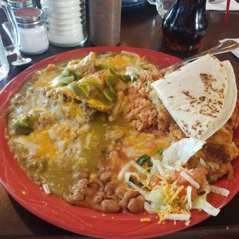 MartAnne's - Chilaquiles with pork green chili, hash browns, rice, beans and a tortilla - Breakfast & Brunch Near Me - Flagstaff, Arizona
