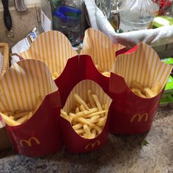 McDonald's - Pay $11 for large fries and they look like this?! Don't know why I bother to stop here!