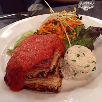 Manna London - Enchilada lasagna. A beautiful combo of Mexican and Italian flavors. - Vegan Near Me - London, XGL Manna London - Enchilada lasagna. A beautiful combo of Mexican and Italian flavors. - Vegan Near Me - London, XGL