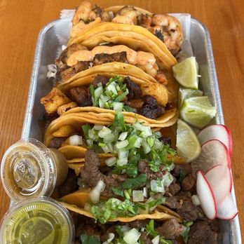 Tacos A La Madre - Top to bottom: Taco de Camarn (Shrimp), El Taco Al Pastor (Pork w/Pineapple), Taco de Carne Asada (Steak) - Tacos Near Me - College Park, Maryland Tacos A La Madre - Top to bottom: Taco de Camarn (Shrimp), El Taco Al Pastor (Pork w/Pineapple), Taco de Carne Asada (Steak) - Tacos Near Me - College Park, Maryland