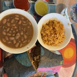 Birria burrito with bean, rice and fries Birria burrito with bean, rice and fries